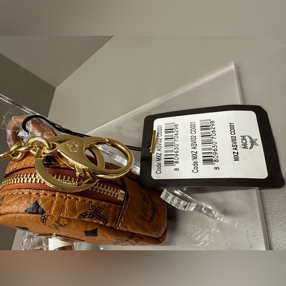 MCM MICRO BACKPACK WITH CROSSBODY STRAP. Can also be used as a bag charm. NWT - Picture 7 of 10